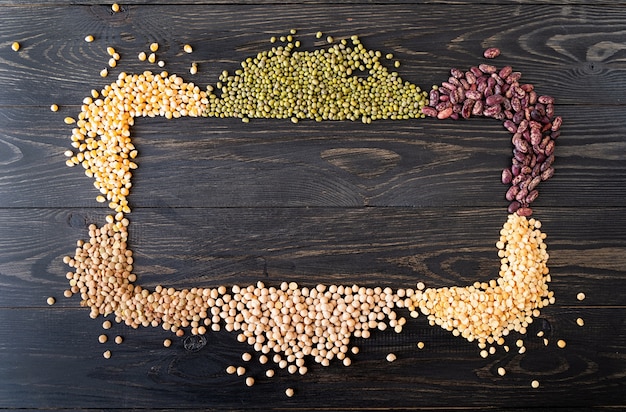 Photo various dried legumes forming a frame flat lay