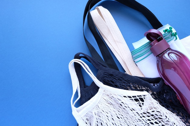 Various eco-friendly packaging on a dark blue background.