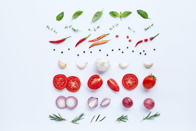 Various fresh vegetables and herbs on white background. Healthy eating concept