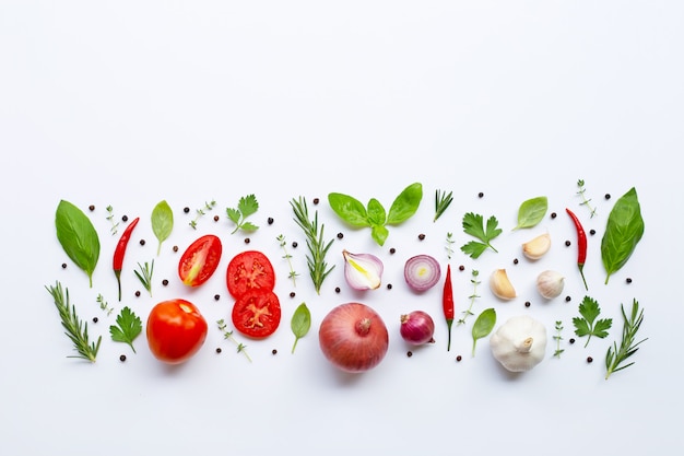 Various fresh vegetables and herbs on white background. Healthy eating concept