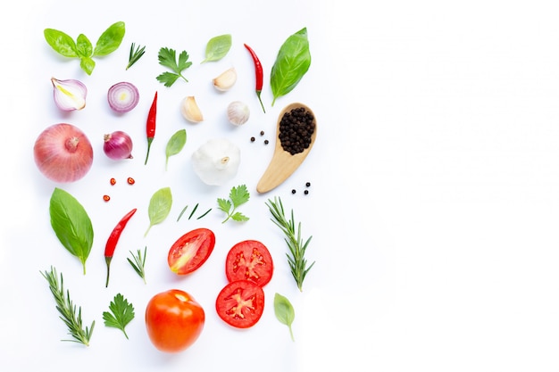 Various fresh vegetables and herbs on white background. Healthy eating concept