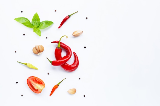 Various fresh vegetables and herbs on white background. 