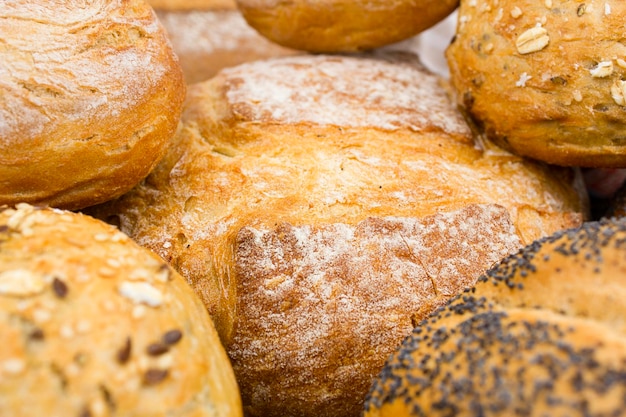 Various freshly baked bread close up Texture of fresh baked goods