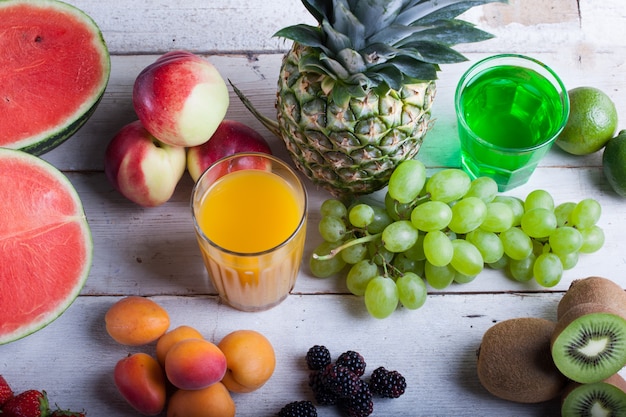 Various fruits on the white wooden table