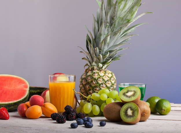 Various fruits on the white wooden table