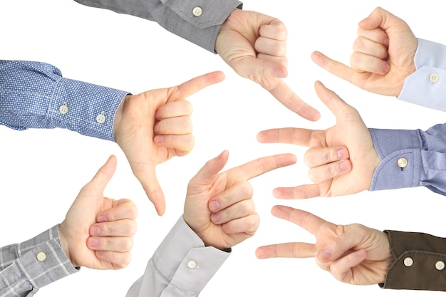 Various gestures of male hands between each other on a white.