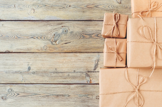 Various gift boxes on wooden table, top view