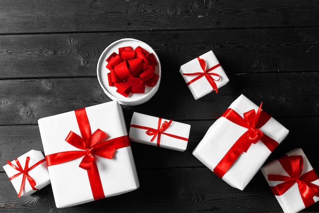 Various gift boxes on wooden table, top view