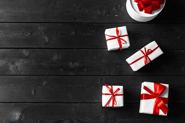 Various gift boxes on wooden table, top view