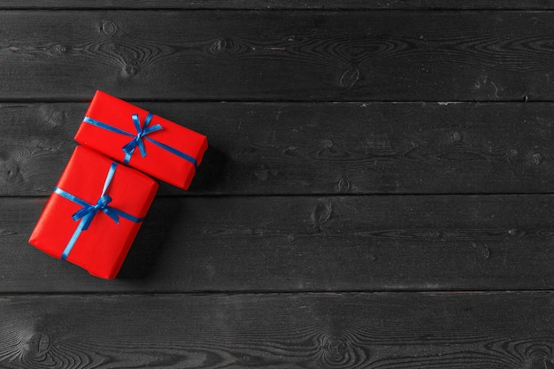 Various gift boxes on wooden table, top view