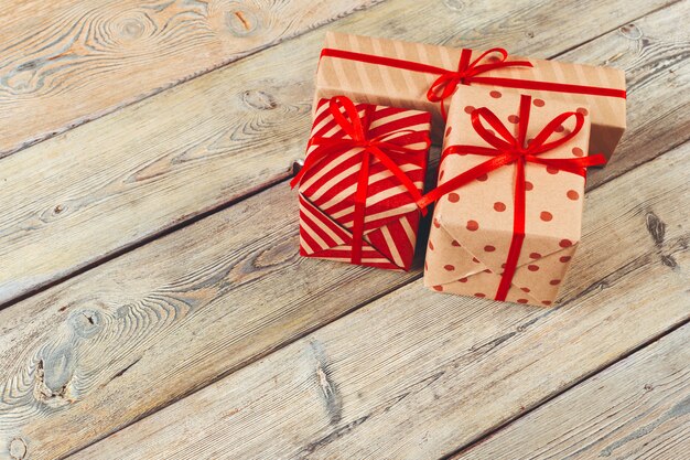 Various gift boxes on wooden table