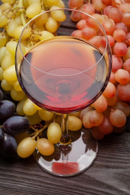 Various grapes and glass of red wine