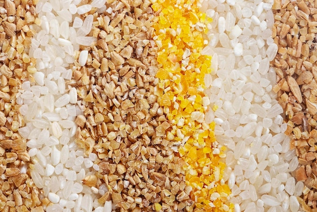 Various groats cereals different types of groats as a background