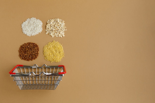 Various groats in grocery basket Rice and oatmeal buckwheat and millet