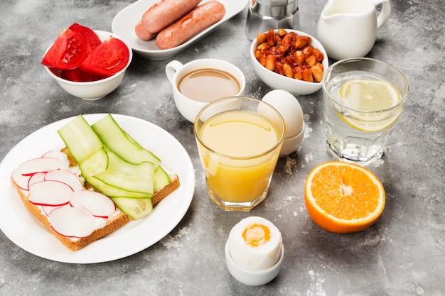 Various healthy breakfast on gray space