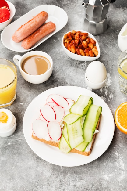 Various healthy breakfast on gray space