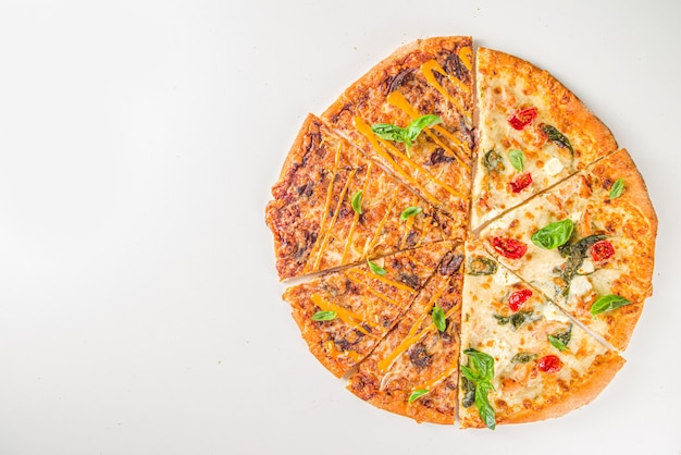 Various Italian traditional pizza slices