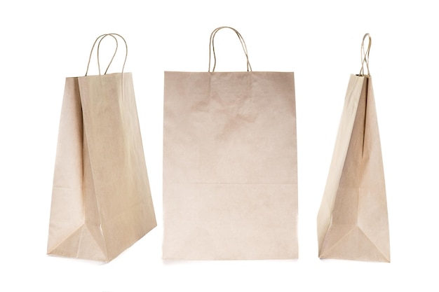 Various kraft paper bags isolated on white background