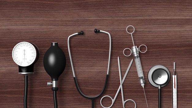 Photo various medical equipment on wooden background