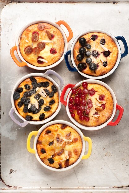 Various mini cheesecake with berries Cottage cheese casserole