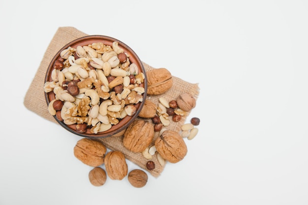 Various nuts on a plate top view