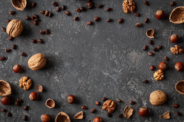 Various nuts on stone table