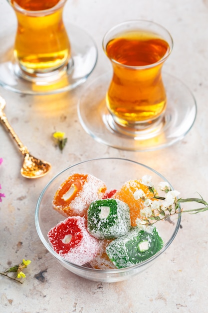 various pieces of turkish delight lokum and black tea