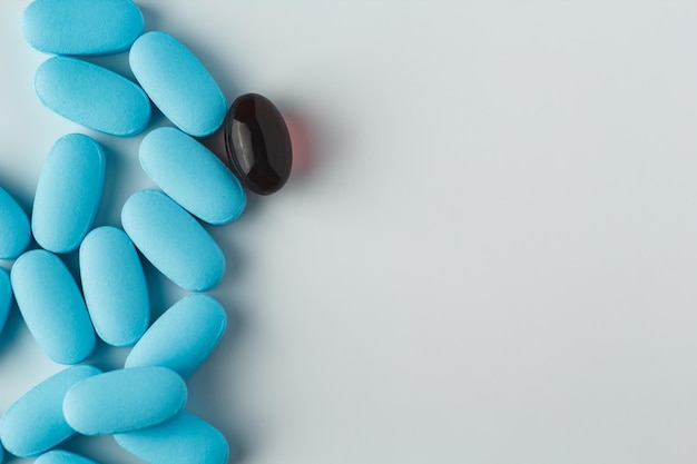 Various pills on a light background vitamins and medicine