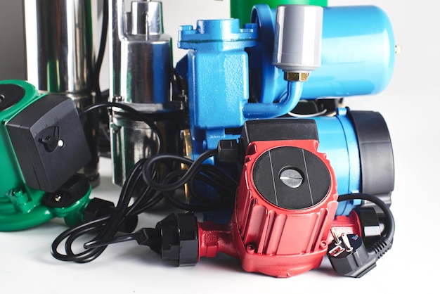 Various pumping equipment for heating and water supply on a white background.