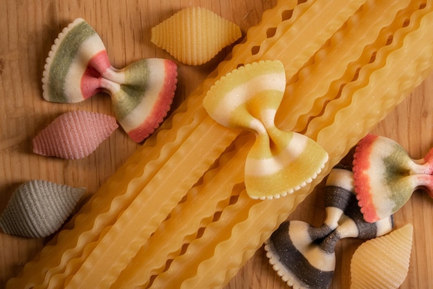 Various raw pasta and spagetti Traditional Italian cuisine Top view