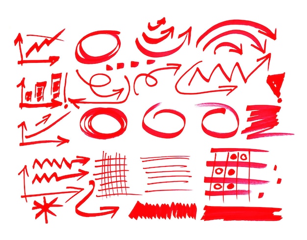 Various red pens on a white background