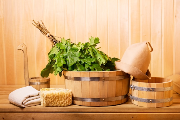 Various sauna accessories in a wooden sauna