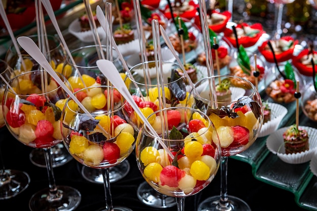 Various snacks buffet table with different dishes Serving food in a restaurant at a party