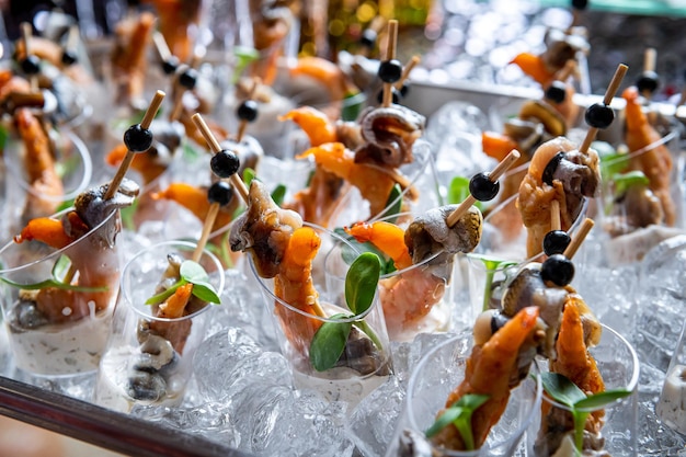 Various snacks buffet table with different dishes