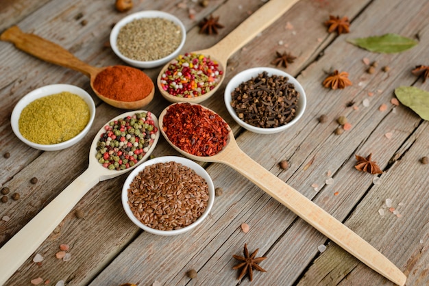 Various spices against a dark background. Food ingredients. It can be used as a background