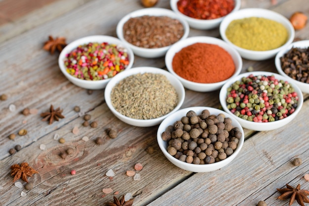 Various spices against a dark background. Food ingredients