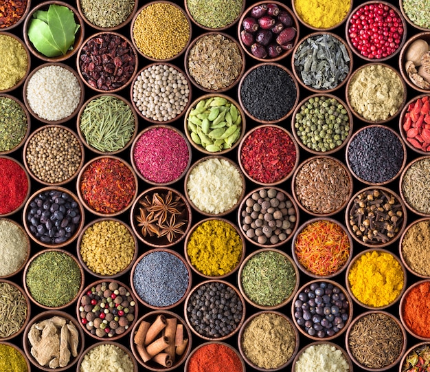 Various spices and condiments in cups