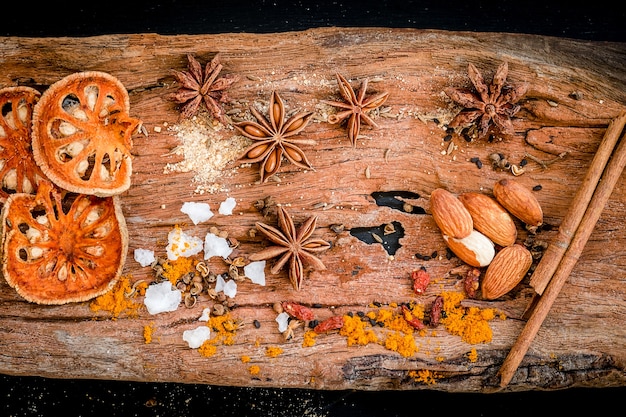 Various spices, herb  and ingredients on wooden table