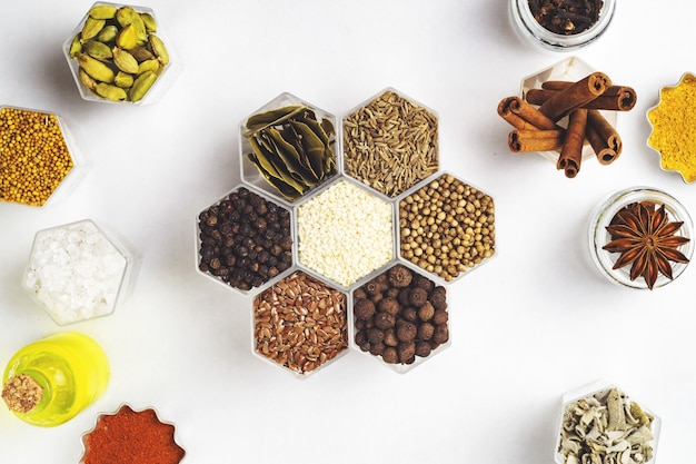 Various spices in hexagonal jars