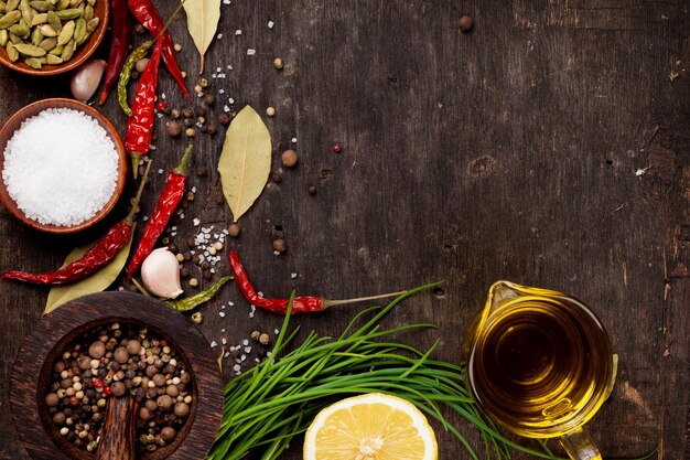 Various spices on wooden background