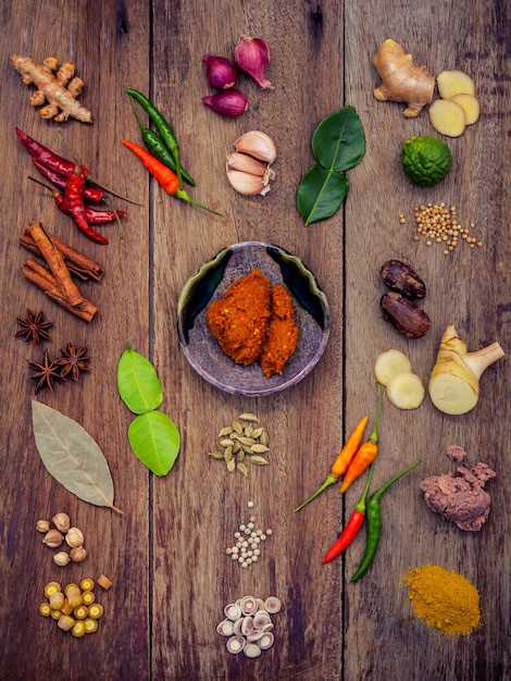 Various of thai food cooking ingredients and spice on rustic wooden background.