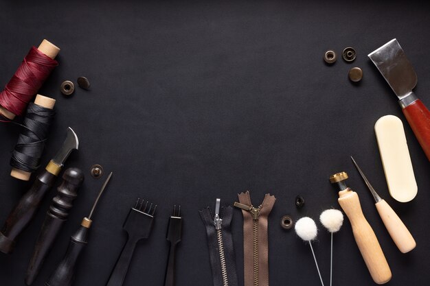 Photo various tools for sewing handmade leather goods