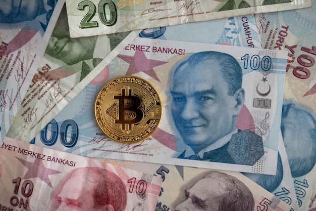 Various Turkish Lira Banknotes and Bitcoin