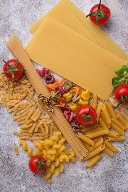 Various type of pasta and cherry tomato