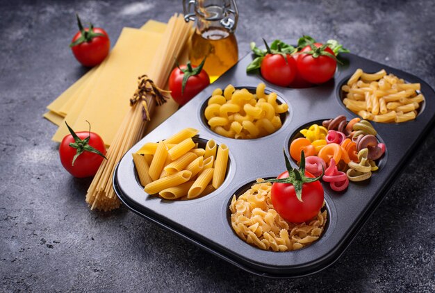 Various type of pasta and cherry tomato