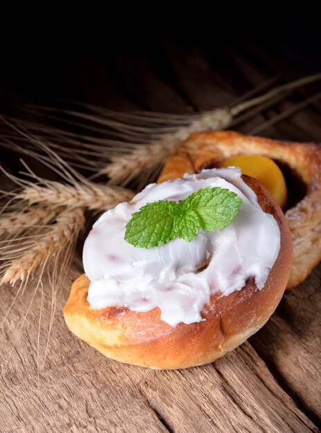 Various types of bread on wooden