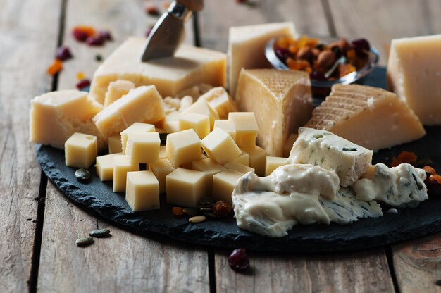 Various types of cheese on the table