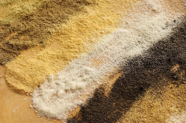 Various types of flour on thewooden background