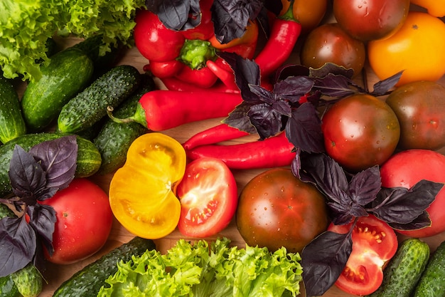 Various vegetables and salad leaves.