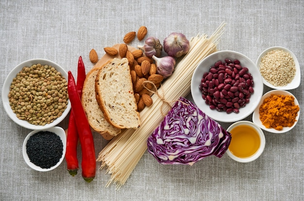 Various vegetarian products on a gray background